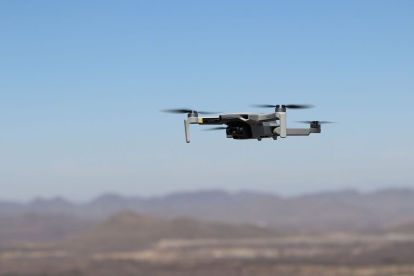 quadcopter drone flying outdoors