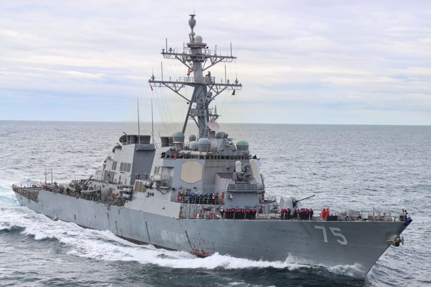 U.S. Navy destroyer with radar arrays underway at sea