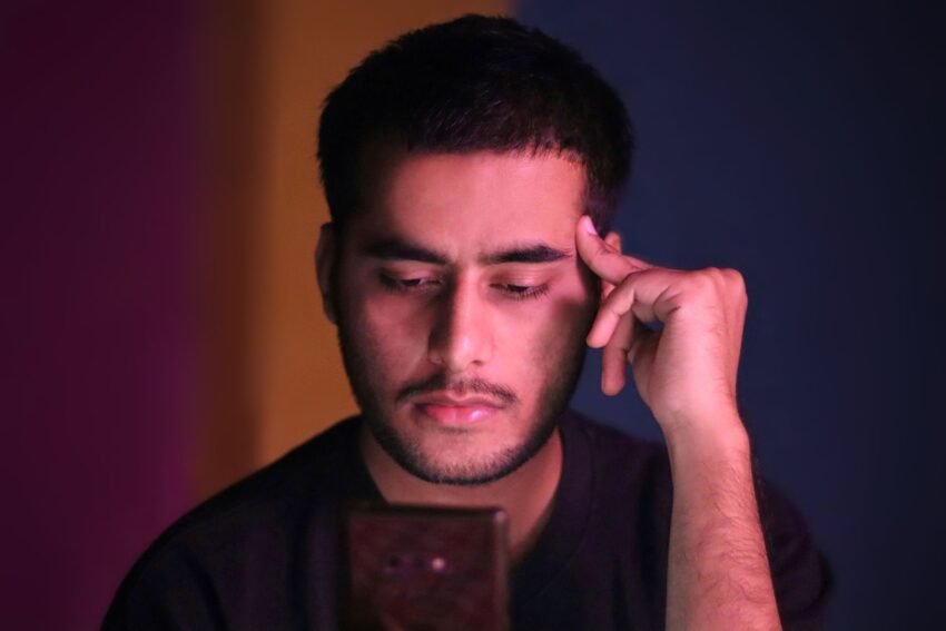 Person using a smartphone for facial identity verification