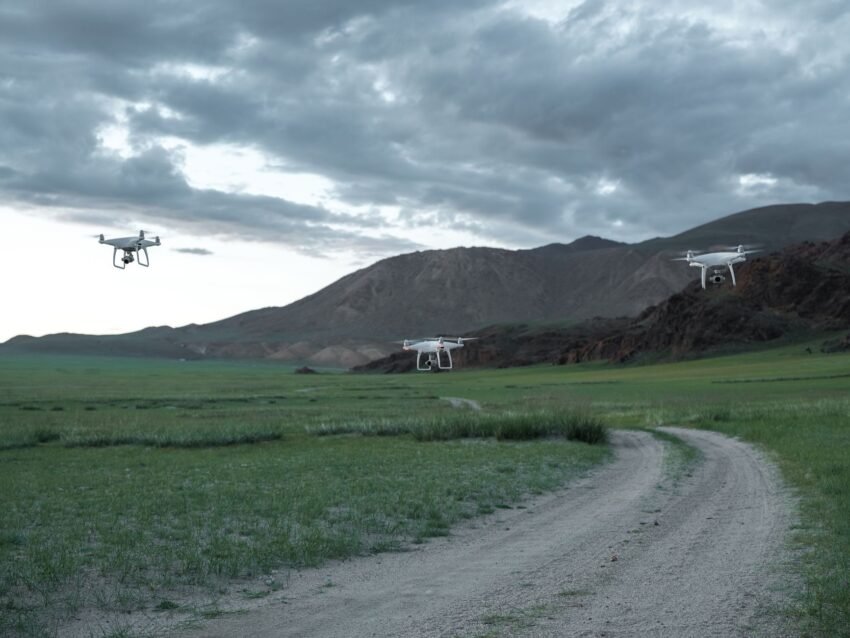 drone flying over rugged landscape